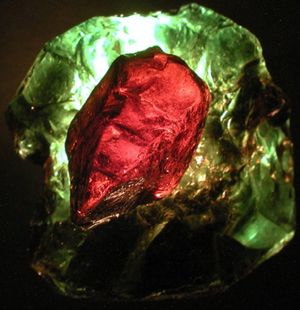 Overlaid tourmaline crystals demonstrating the Usambara effect.